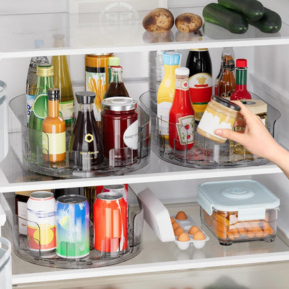 Three trays in use on fridge shelves holding bottles, jars and cans