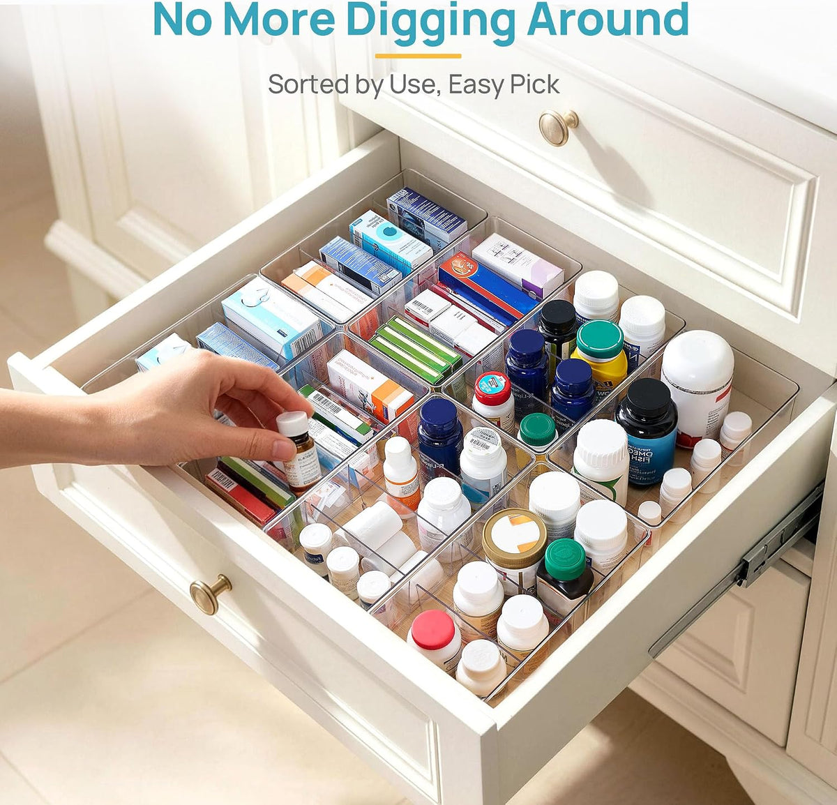 Bins sorting a drawer of small bottles and medicines